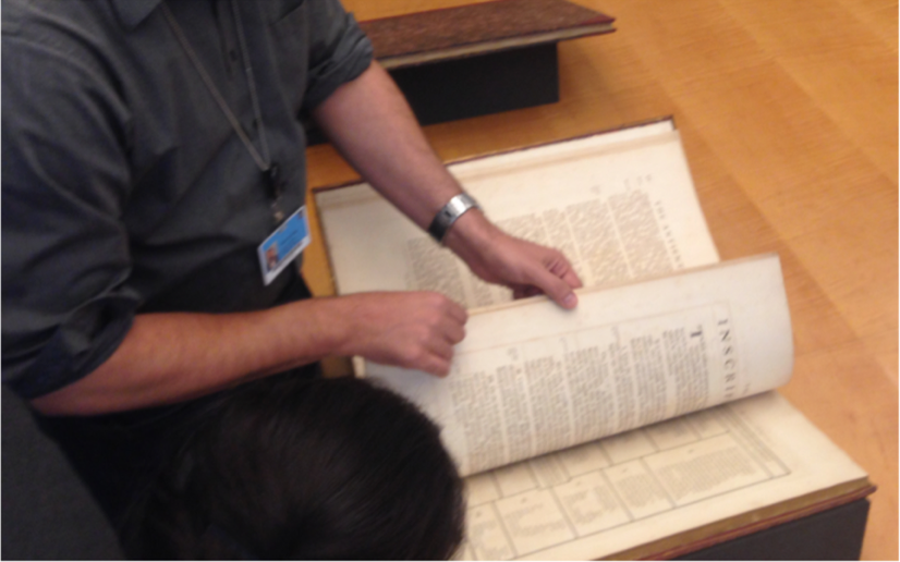 curator-with-book