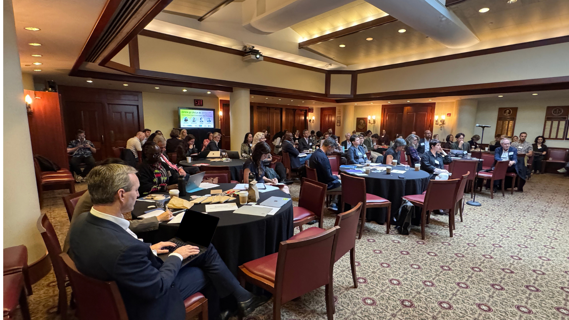 A photo of a full room during the OPEN @ UNGA81 symposium in New York in 2026.